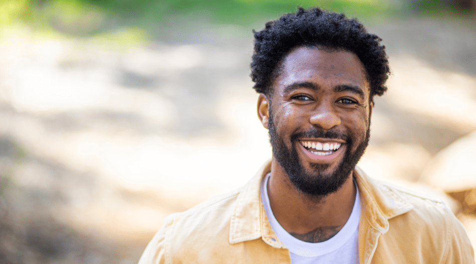 Man standing outside smiling